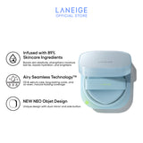 A pale blue Laneige NEO Cushion Mewy refill compact is shown open, revealing its cushion and showcasing its unique dual mirror and side button design, highlighting its airy seamless technology and 89% skincare ingredients for a flawless, long-lasting complexion.